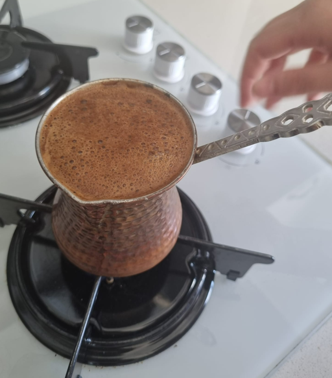 A photo of foam forming in coffee